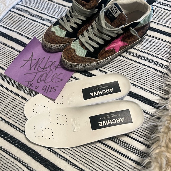 Golden goose size 35 mid stars.  Archive pair HTF!
Like new - Picture 1 of 6